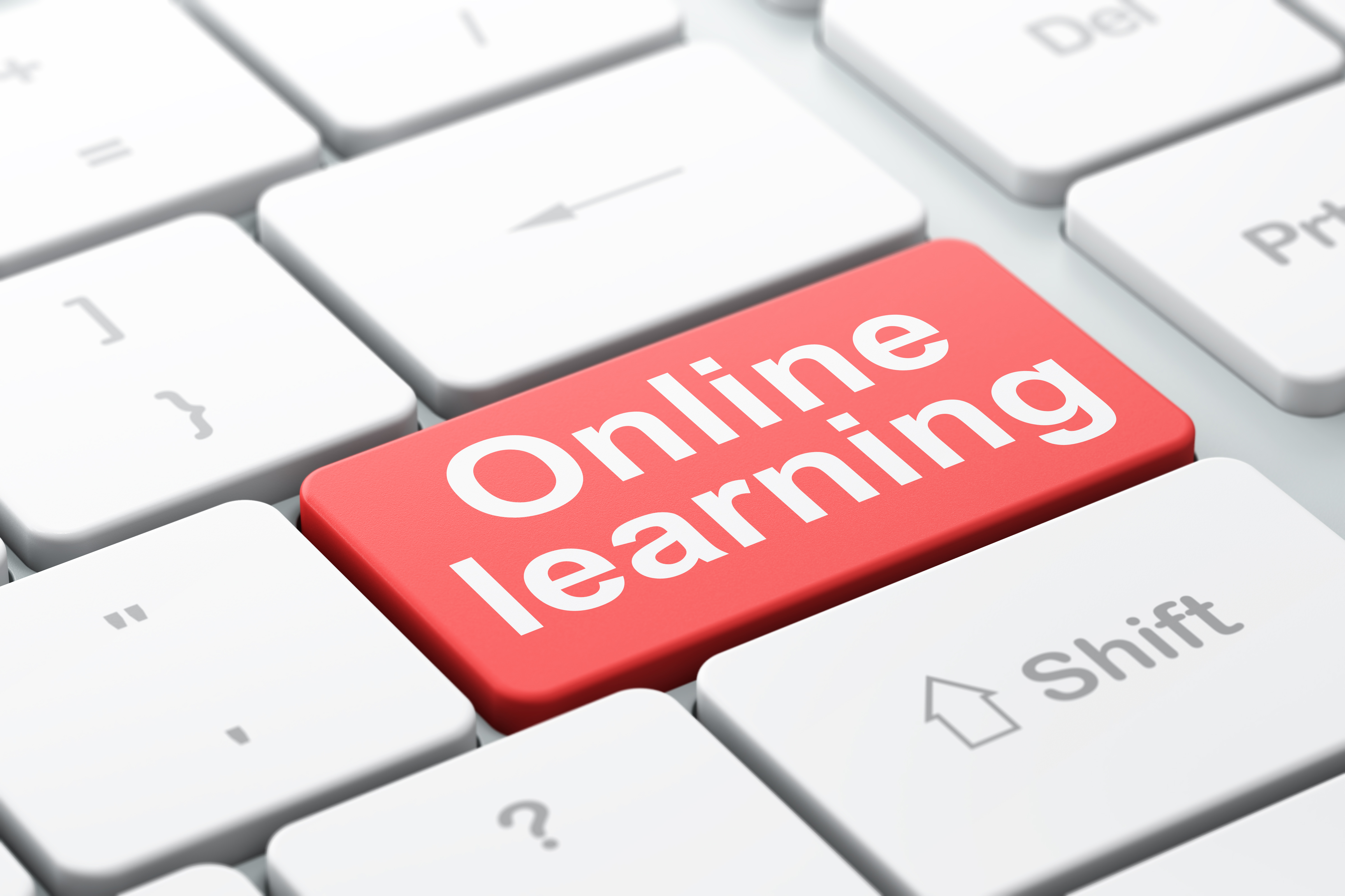 Computer Learning Online Learning Education concept: Online Learning on computer keyboard backgrou